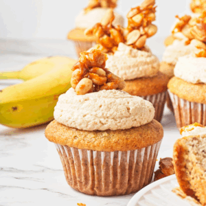 Vegan peanut butter banana cupcakes topped with peanut brittle