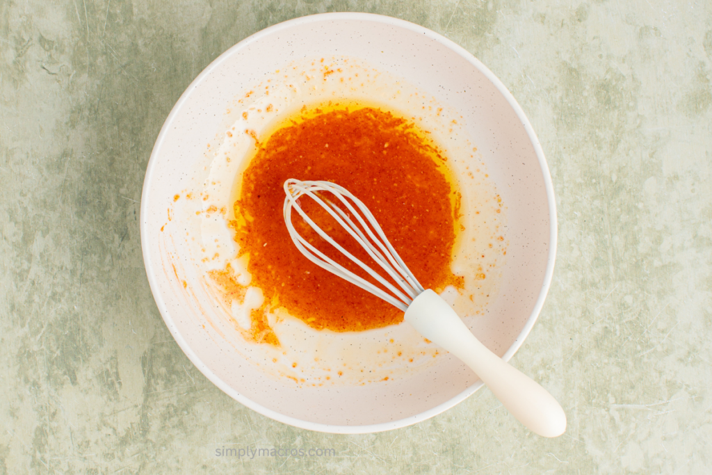 lime juice and other ingredients mixed together in a bowl.