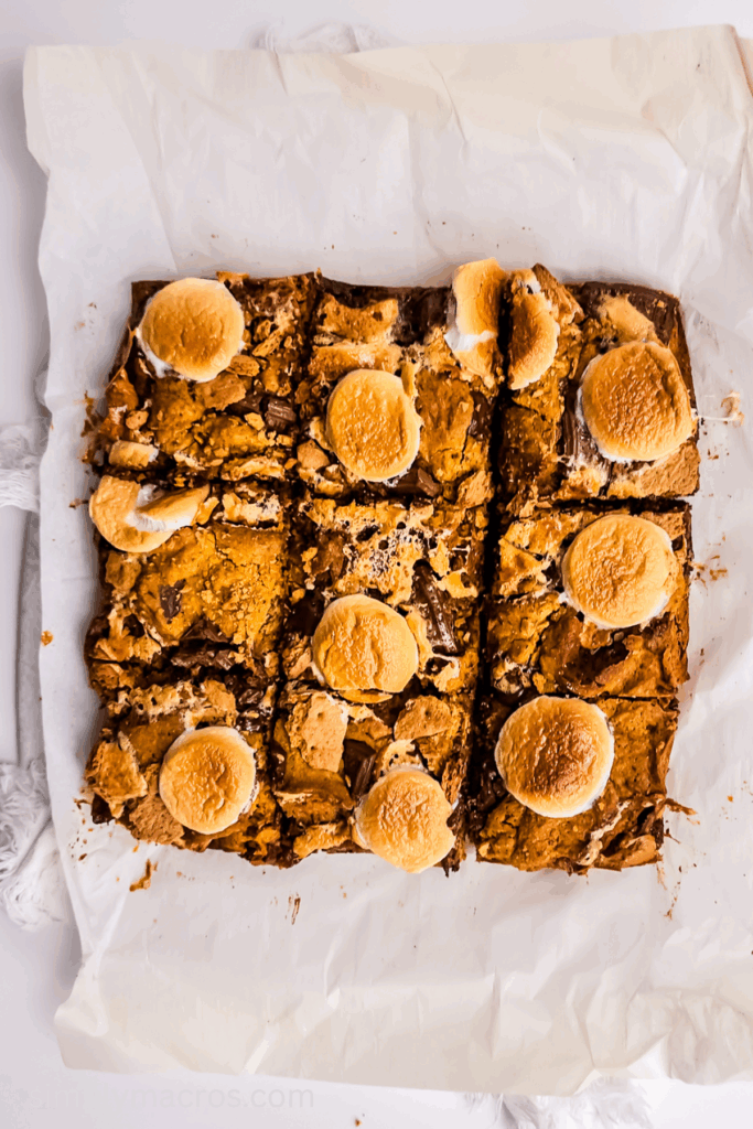 Pumpkin S'mores Bars lifted out of the pan and sliced.