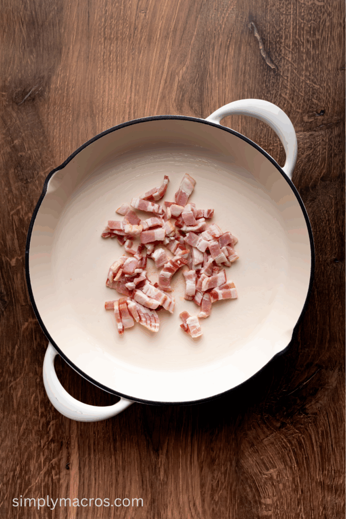 Bacon cooking in the skillet.