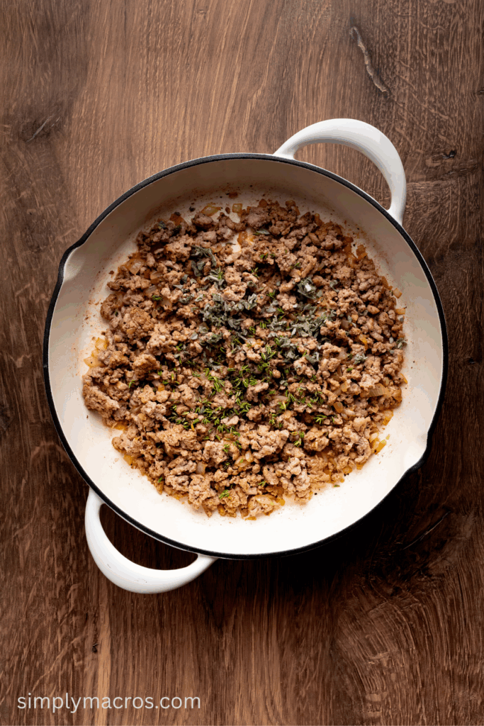Skillet with ground turkey, sage, and thyme.