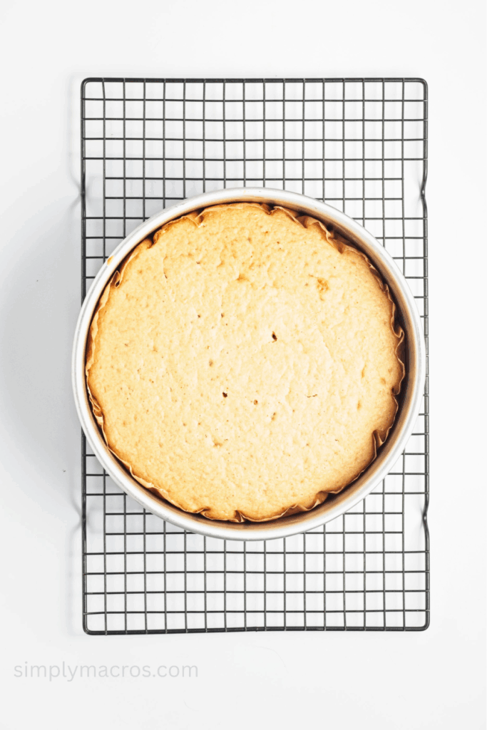 Pineapple upside down cake on a cooling rack.